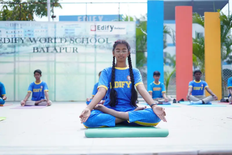 A student practising yoga